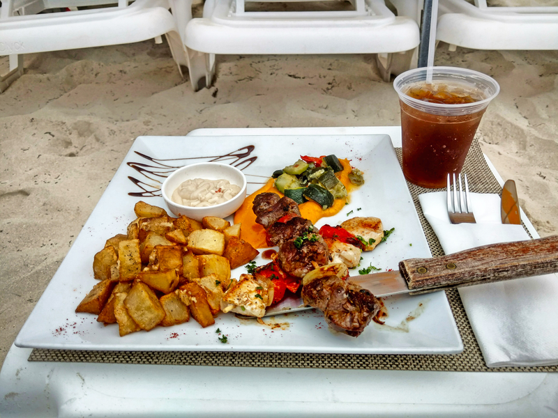 Kebabs at the fancy beach bar in Orient Bay Beach